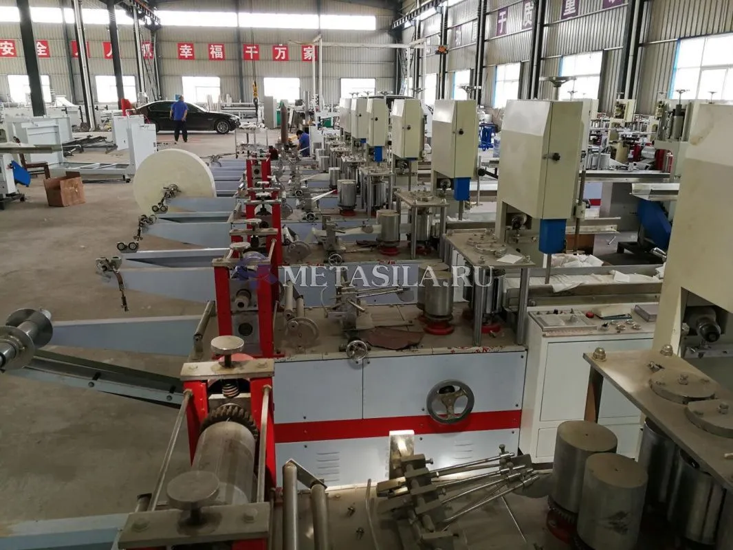 картинка Машина для производства гигиенических салфеток от магазина компании Метасила